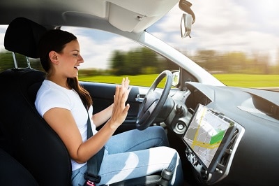 woman sitting in self driving car