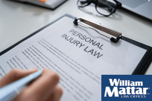 Document on clip board about personal injury law