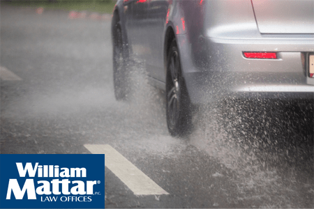 car traveling in rain