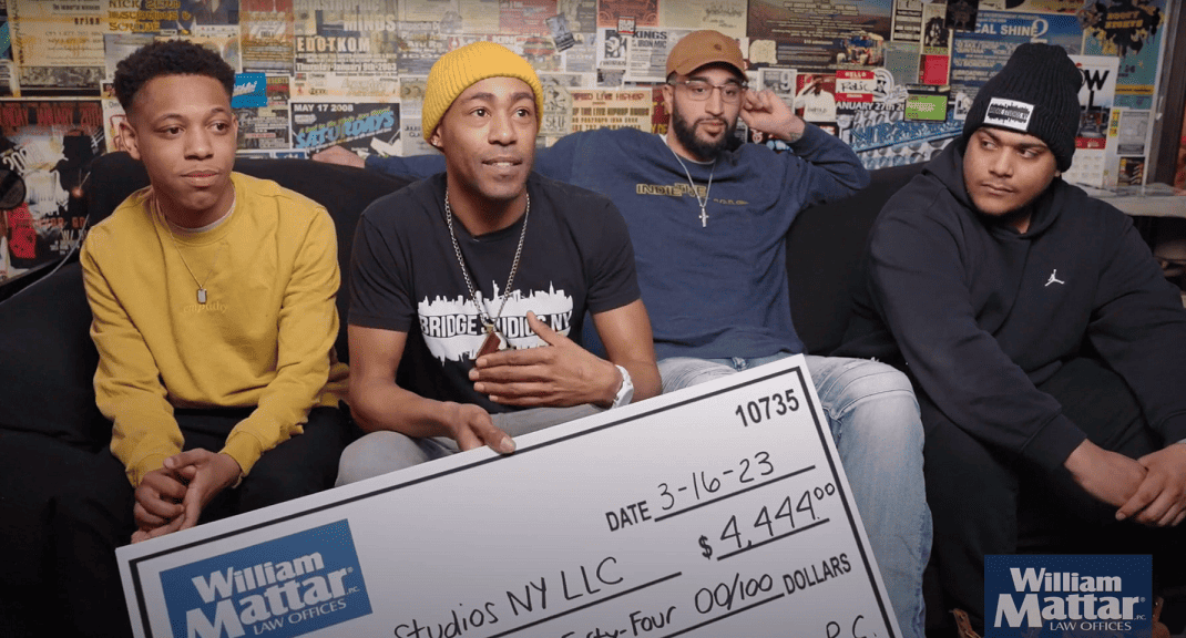 interview of Bridge Studios NY LLC winning $4,444 holding their check infront of camera