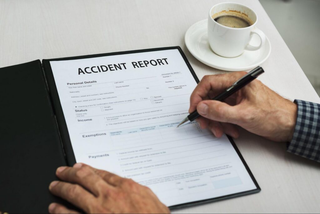 Motorcycle accident being filled out by a New York State motorcycle rider after an accident