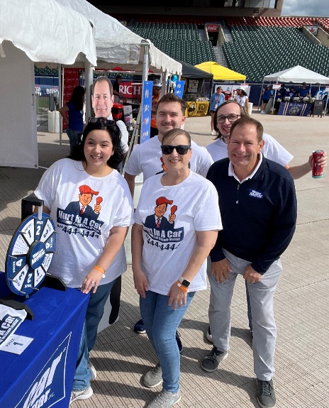 William Mattar team members at the National Buffalo Wing Festival prize wheel tent